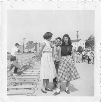 1953 on the sidewalk in front of the school
